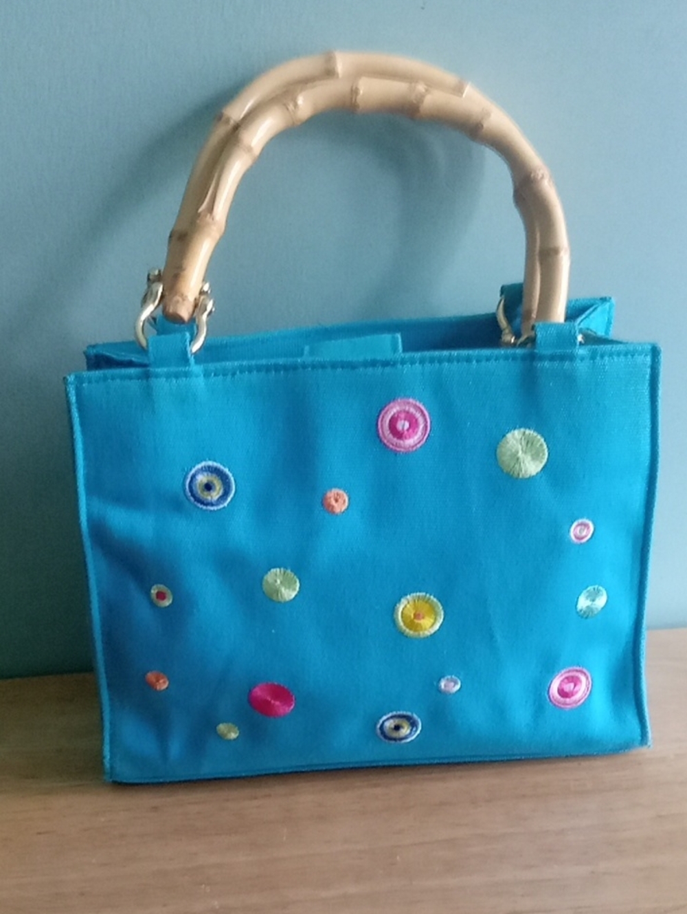 Tianni Turquoise Embroidered Canvas Handbag with Structured Design